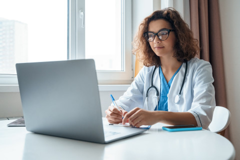 doctor at a computer