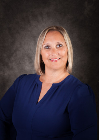 blonde women in navy dress shirt