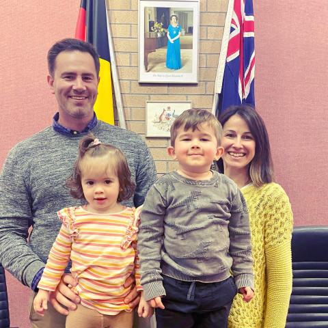 Young family smiling together